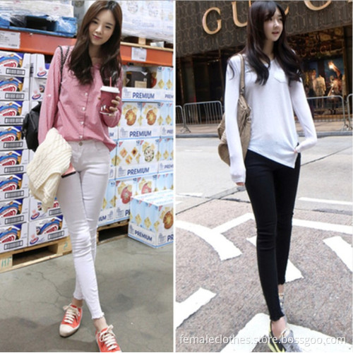 Slim jeans female white hole edges/Los pantalones vaqueros delgados bordes del agujero blanco hembra